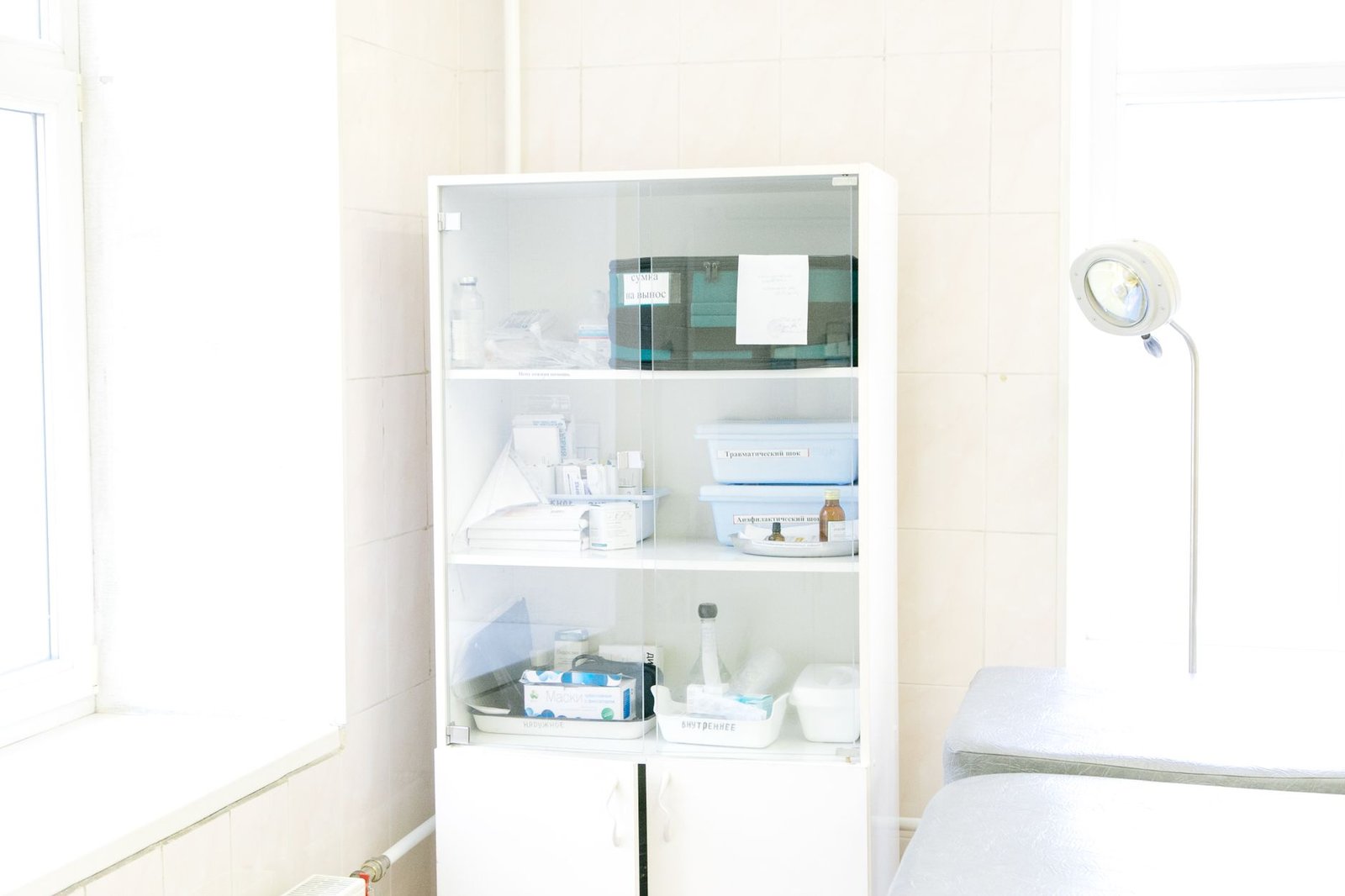 Neatly arranged supplies in a clean treatment room.
