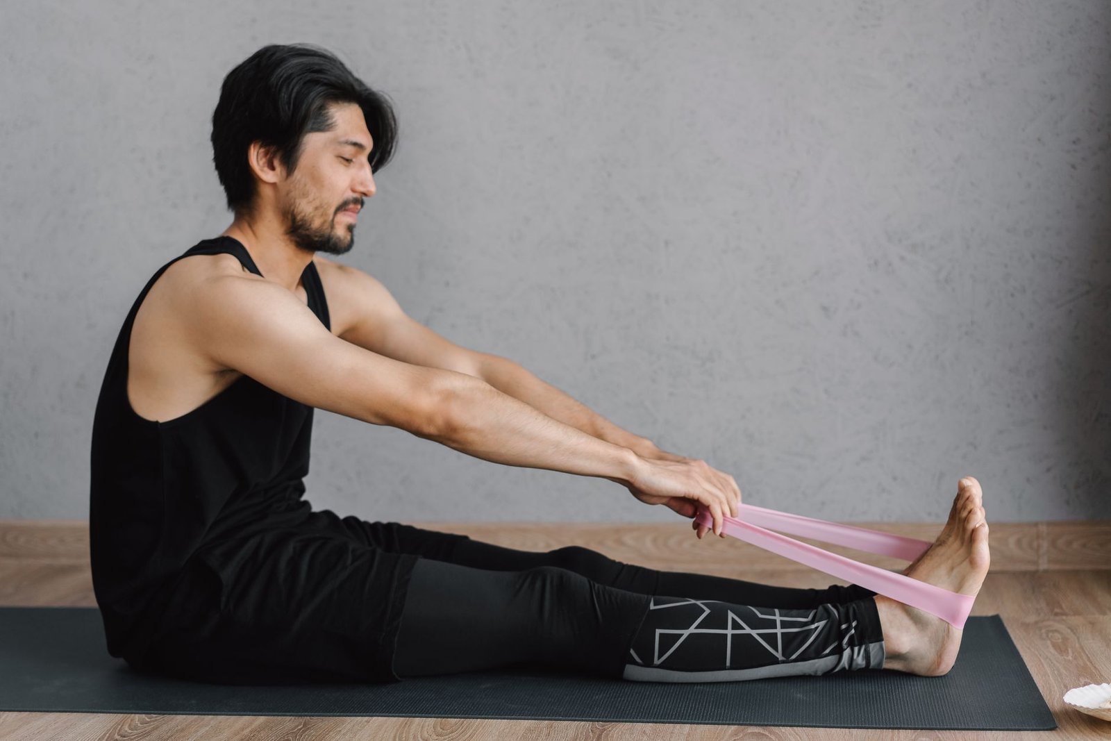 Resistance bands being used during a stretching exercise.