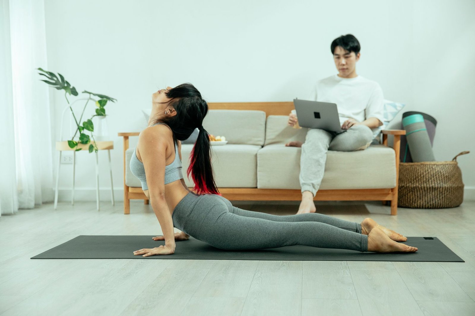 A calm, bright living room set up for gentle exercise at home.